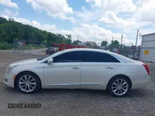 2013 Cadillac XTS Luxury with VIN 2G61P5S34D9138319, listed as a IAAI auction lot 42626756 with 88,743 mi miles and . Bid and sale history available at DreamBid. Image 14.