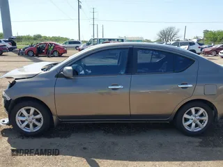 2012 Nissan Versa SV with VIN 3N1CN7AP8CL906636, listed as a IAAI auction lot 42007827 with 111,627 mi miles. Bid and sale history available at carsss.com. Image 15.