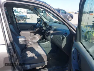 2006 Ford Escape XLS z VIN 1FMYU02Z16KA22746, wystawiony jako IAAI lot #41949781 z przebiegiem 231 666 mil mil oraz . Historia ofert i sprzedaży dostępna na DreamBid. Obrazek 5.