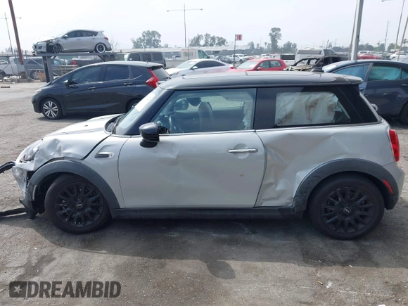 2021 MINI Hardtop Cooper with VIN WMWXR3C09M2N96671, listed as a IAAI auction lot 42031023 with 12,450 mi miles and . Bid and sale history available at DreamBid. Image 14.