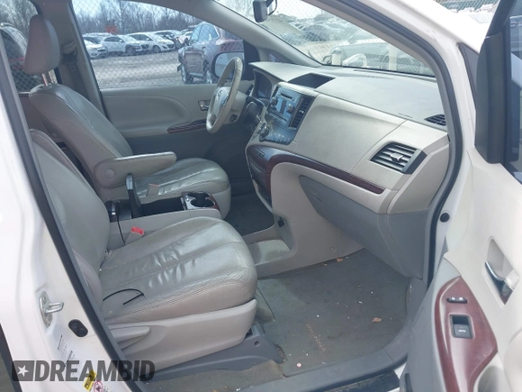 2011 Toyota Sienna XLE with VIN 5TDDK3DC3BS029395, listed as a IAAI auction lot 41715459 with 235,772 mi miles. Bid and sale history available at carsss.com. Image 5.