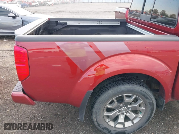 2021 Nissan Frontier SV z VIN 1N6ED0EA8MN718185, wystawiony jako IAAI lot #41878389 z przebiegiem 40 315 mil mil oraz . Historia ofert i sprzedaży dostępna na DreamBid. Obrazek 20.