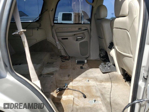 2004 Cadillac Escalade z VIN 1GYEC63T44R235759, wystawiony jako Copart lot #53166755 z przebiegiem 212 034 mil mil oraz Szkody całkowita. Historia ofert i sprzedaży dostępna na DreamBid. Obrazek 11.