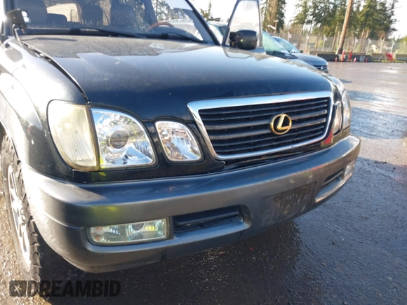 2001 Lexus LX 470 with VIN JTJHT00W613500563, listed as a IAAI auction lot 41730804 with 232,647 mi miles and . Bid and sale history available at carsss.com. Image 6.