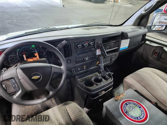 2013 Chevrolet Express Cargo z VIN 1GCWGFCA8D1141881, wystawiony jako IAAI lot #42728830 z przebiegiem 208 897 mil mil oraz . Historia ofert i sprzedaży dostępna na DreamBid. Obrazek 12.