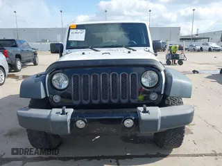 2015 Jeep Wrangler Willys Wheeler with VIN 1C4AJWAG0FL562536, listed as a IAAI auction lot 42384747 with 103,507 mi miles and . Bid and sale history available at DreamBid. Image 12.