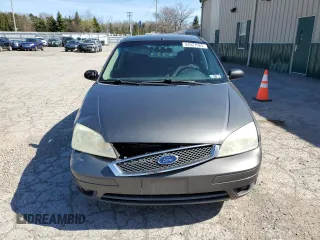 2005 Ford Focus S z VIN 3FAFP37N25R133770, wystawiony jako Copart lot #54927585 z przebiegiem 179 959 mil mil oraz Nie do naprawy. Historia ofert i sprzedaży dostępna na DreamBid. Obrazek 5.