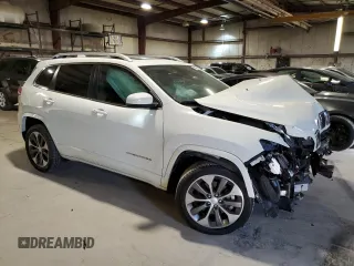 2019 Jeep Cherokee with VIN 1C4PJLJN4KD208014, listed as a Copart auction lot 73403614 with 16,863 mi miles and Salvage title. Bid and sale history available at DreamBid. Image 4.