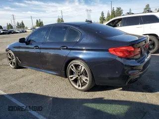 2020 BMW 5 Series M550i xDrive with VIN WBAJS7C06LBN96210, listed as a Copart auction lot 46769365 with 39,710 mi miles and Salvage title. Bid and sale history available at DreamBid. Image 2.