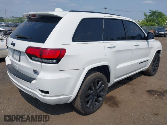2020 Jeep Grand Cherokee Laredo E with VIN 1C4RJFAG5LC375033, listed as a IAAI auction lot 42415231 with 62,489 mi miles and . Bid and sale history available at DreamBid. Image 4.