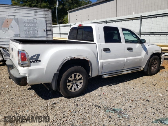 2007 Mitsubishi Raider LS z VIN 1Z7HT28K57S234309, wystawiony jako Copart lot #75505104 z przebiegiem 210 964 mil mil oraz Szkoda całkowita • Salvage title. Historia ofert i sprzedaży dostępna na DreamBid. Obrazek 3.