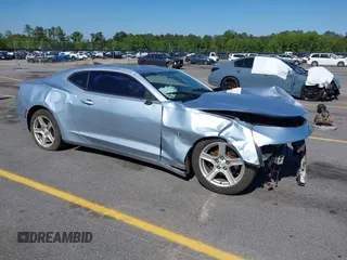 2018 Chevrolet Camaro 1LT z VIN 1G1FB1RX3J0125112, wystawiony jako IAAI lot #42034286 z przebiegiem 179 149 mil mil oraz . Historia ofert i sprzedaży dostępna na DreamBid. Obrazek 1.