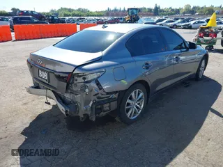2014 Infiniti Q50 Premium with VIN JN1BV7AR4EM700364, listed as a IAAI auction lot 42032156 with 75,469 mi miles and . Bid and sale history available at DreamBid. Image 4.