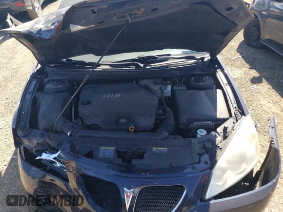 2009 Pontiac G6 w/1SA *Ltd Avail* with VIN 1G2ZG57N294125190, listed as a Copart auction lot 69591384 with 215,658 mi miles and Salvage Title. Bid and sale history available at carsss.com. Image 11.