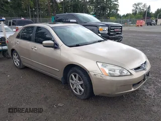 2004 Honda Accord EX with VIN 1HGCM66514A061236, listed as a IAAI auction lot 42565461 with 214,605 mi miles and . Bid and sale history available at DreamBid. Image 1.