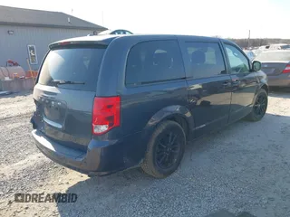 2019 Dodge Grand Caravan SE with VIN 2C4RDGBGXKR727315, listed as a IAAI auction lot 41770222 with 97,561 mi miles and . Bid and sale history available at DreamBid. Image 4.