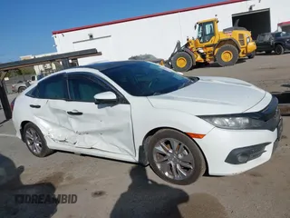 2017 Honda Civic Sedan EX-L with VIN 2HGFC1F71HH636172, listed as a IAAI auction lot 38464968 with 74,030 mi miles. Bid and sale history available at carsss.com. Image 6.