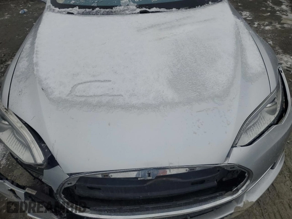 2013 Tesla Model S with VIN 5YJSA1AC9DFP10705, listed as a Copart auction lot 89394665 with Not Provided miles and Salvage Title. Bid and sale history available at carsss.com. Image 12.