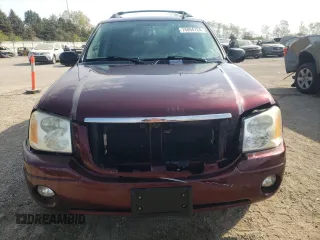 2006 GMC Envoy SLE with VIN 1GKET16S766125647, listed as a Copart auction lot 74894724 with 162,905 mi miles and Salvage Title. Bid and sale history available at DreamBid. Image 5.
