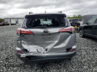2017 Toyota RAV4 LE z VIN 2T3BFREVXHW547834, wystawiony jako Copart lot #57886525 z przebiegiem 97 586 mil mil oraz Szkoda całkowita • Salvage title. Historia ofert i sprzedaży dostępna na DreamBid. Obrazek 6.
