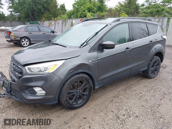 2017 Ford Escape SE z VIN 1FMCU9G95HUC83618, wystawiony jako IAAI lot #42324672 z przebiegiem 132 910 mil mil oraz . Historia ofert i sprzedaży dostępna na DreamBid. Obrazek 17.