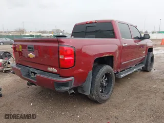 2014 Chevrolet Silverado 1500 High Country with VIN 3GCUKTEC7EG412306, listed as a IAAI auction lot 41721027 with 256,888 mi miles. Bid and sale history available at carsss.com. Image 4.