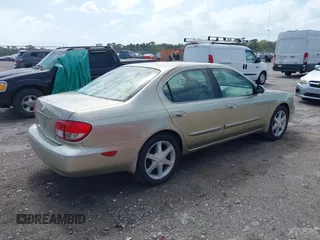 2003 Infiniti I35 Luxury with VIN JNKDA31A03T112208, listed as a IAAI auction lot 41760664 with 148,826 mi miles. Bid and sale history available at carsss.com. Image 4.