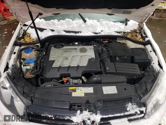 2013 Volkswagen Golf TDI z VIN WVWDM7AJ0DW133057, wystawiony jako Copart lot #37497304 z przebiegiem 137 037 mil mil oraz Szkoda całkowita • Salvage title. Historia ofert i sprzedaży dostępna na DreamBid. Obrazek 11.