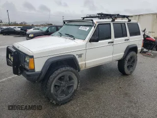 1989 Jeep Cherokee z VIN 1J4FT28LXKL601505, wystawiony jako Copart lot #49312265 z przebiegiem 264 769 mil mil oraz Szkoda całkowita • Salvage title. Historia ofert i sprzedaży dostępna na DreamBid. Obrazek 1.