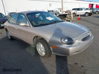 1999 Ford Taurus SE with VIN 1FAFP53U4XG223246, listed as a IAAI auction lot 41570969 with 59,064 mi miles. Bid and sale history available at carsss.com. Image 1.