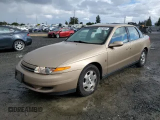 2002 Saturn LS z VIN 1G8JW54R52Y513297, wystawiony jako Copart lot #70874034 z przebiegiem 120 567 mil mil oraz Tytuł czysty. Historia ofert i sprzedaży dostępna na DreamBid. Obrazek 1.