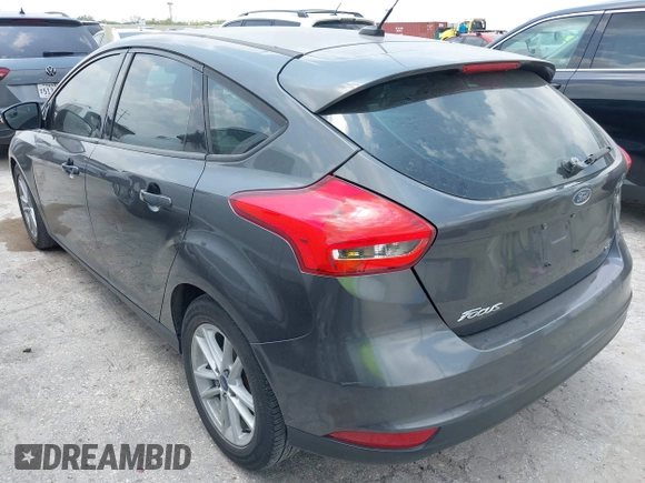 2017 Ford Focus SE with VIN 1FADP3K24HL318684, listed as a IAAI auction lot 42161586 with 196,681 mi miles and . Bid and sale history available at carsss.com. Image 3.