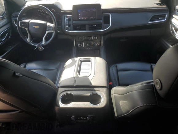 2023 Chevrolet Suburban LS with VIN 1GNSCBKD8PR163178, listed as a Copart auction lot 47844175 with 104,369 mi miles and Salvage Title. Bid and sale history available at DreamBid. Image 8.