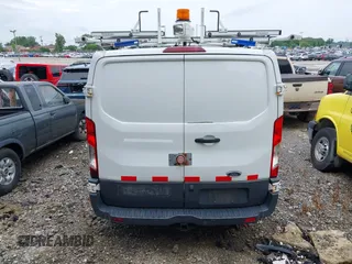 2016 Ford Transit Cargo z VIN 1FTYR1YM7GKB55438, wystawiony jako IAAI lot #42497571 z przebiegiem 66 612 mil mil oraz . Historia ofert i sprzedaży dostępna na DreamBid. Obrazek 17.