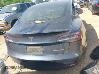 2019 Tesla Model 3 Long Range with VIN 5YJ3E1EB2KF510398, listed as a IAAI auction lot 42067654 with 108,971 mi miles and . Bid and sale history available at DreamBid. Image 15.