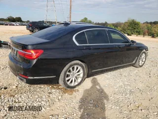 2018 BMW 7 Series 740i xDrive with VIN WBA7E4C5XJGV24003, listed as a Copart auction lot 71395443 with 63,558 mi miles. Bid and sale history available at carsss.com. Image 3.