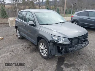 2017 Volkswagen Tiguan S with VIN WVGBV7AX9HK049420, listed as a IAAI auction lot 41838301 with 118,490 mi miles and . Bid and sale history available at DreamBid. Image 1.