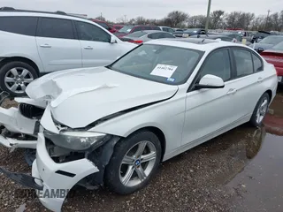 2014 BMW 3 Series 328i xDrive with VIN WBA3B5G50ENS06304, listed as a IAAI auction lot 41402704 with 139,943 mi miles. Bid and sale history available at carsss.com. Image 2.