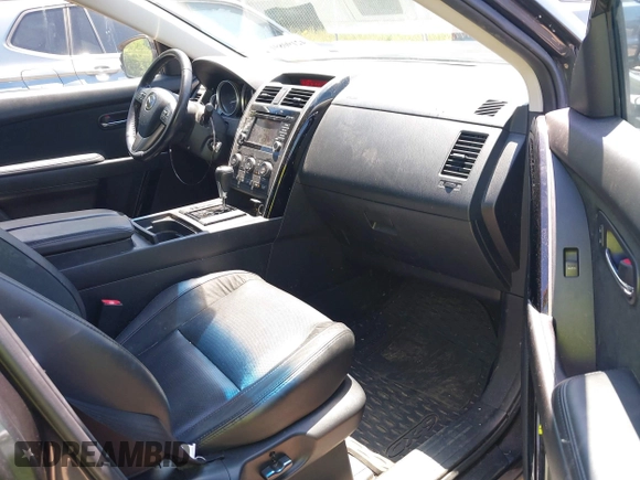 2014 Mazda CX-9 Touring with VIN JM3TB2CA0E0438247, listed as a IAAI auction lot 42190891 with 142,117 mi miles and . Bid and sale history available at carsss.com. Image 5.
