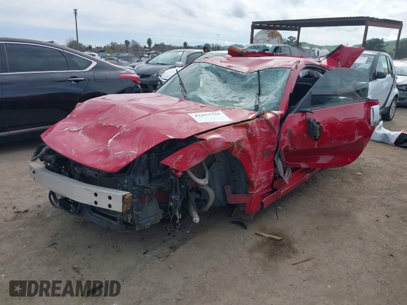 2003 Nissan 350Z Touring with VIN JN1AZ34E13T009880, listed as a IAAI auction lot 41652325 with 1 mi miles. Bid and sale history available at carsss.com. Image 2.