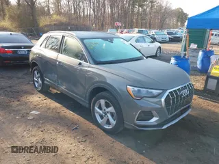 2021 Audi Q3 Premium with VIN WA1AUCF34M1099668, listed as a IAAI auction lot 41990226 with 69,866 mi miles and . Bid and sale history available at DreamBid. Image 1.