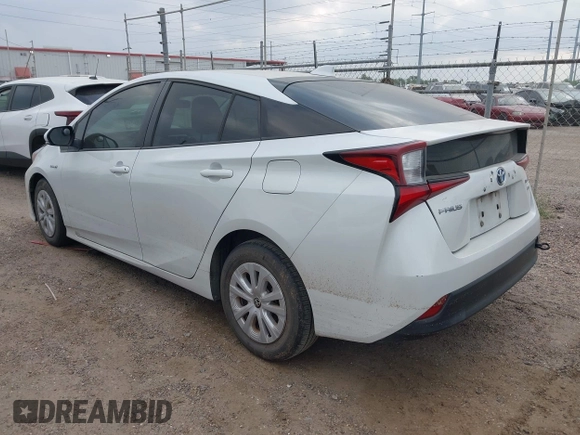 2021 Toyota Prius L Eco with VIN JTDKAMFU5M3132103, listed as a IAAI auction lot 42061511 with 42,116 mi miles and . Bid and sale history available at DreamBid. Image 3.