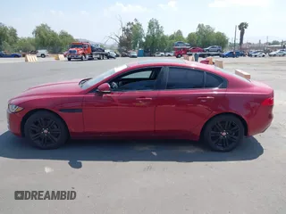 2017 Jaguar XE 25t Prestige with VIN SAJAE4BG6HA947400, listed as a IAAI auction lot 41697309 with 112,862 mi miles. Bid and sale history available at carsss.com. Image 14.