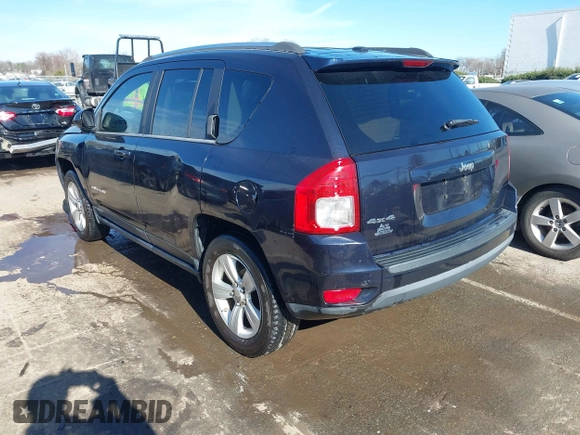 2011 Jeep Compass with VIN 1J4NF1FB6BD180447, listed as a IAAI auction lot 41575014 with 130,694 mi miles. Bid and sale history available at carsss.com. Image 3.