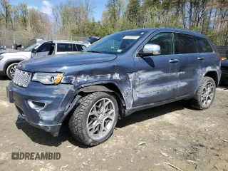 2020 Jeep Grand Cherokee Overland with VIN 1C4RJFCG7LC335839, listed as a Copart auction lot 52320505 with 86,684 mi miles and Salvage Title. Bid and sale history available at DreamBid. Image 1.
