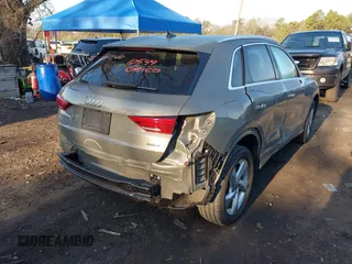 2021 Audi Q3 Premium with VIN WA1AUCF34M1099668, listed as a IAAI auction lot 41990226 with 69,866 mi miles and . Bid and sale history available at DreamBid. Image 6.