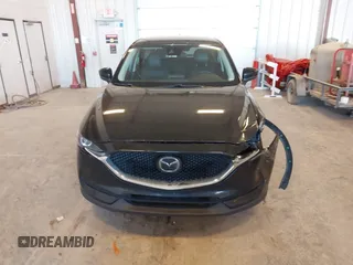 2018 Mazda CX-5 Touring with VIN JM3KFBCM9J0437490, listed as a IAAI auction lot 42006998 with 176,959 mi miles. Bid and sale history available at carsss.com. Image 12.