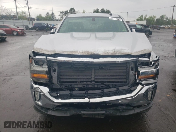 2018 Chevrolet Silverado 1500 LT with VIN 1GCVKREH8JZ102484, listed as a Copart auction lot 55114225 with 59,185 mi miles and Salvage Title. Bid and sale history available at DreamBid. Image 5.