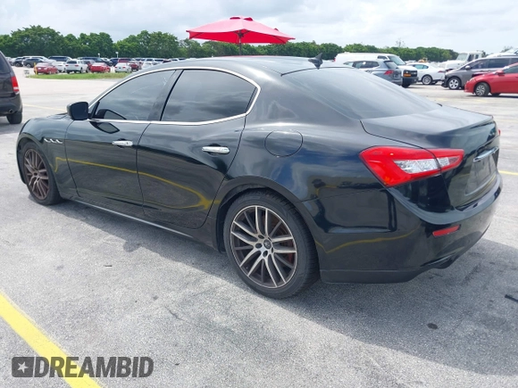 2015 Maserati Ghibli with VIN ZAM57XSA1F1144073, listed as a IAAI auction lot 42770723 with 105,782 mi miles and . Bid and sale history available at DreamBid. Image 3.