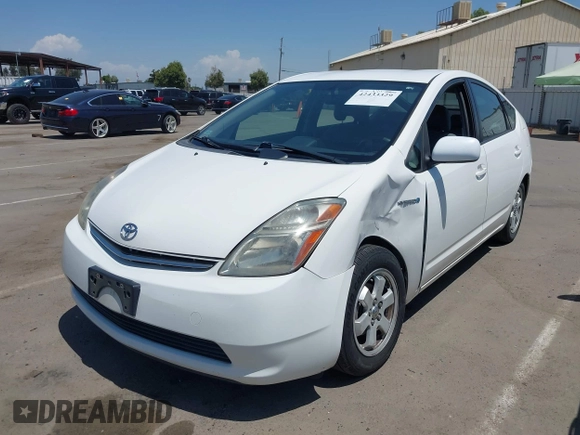 2008 Toyota Prius z VIN JTDKB20U183323310, wystawiony jako IAAI lot #42433329 z przebiegiem 140 100 mil mil oraz . Historia ofert i sprzedaży dostępna na DreamBid. Obrazek 19.